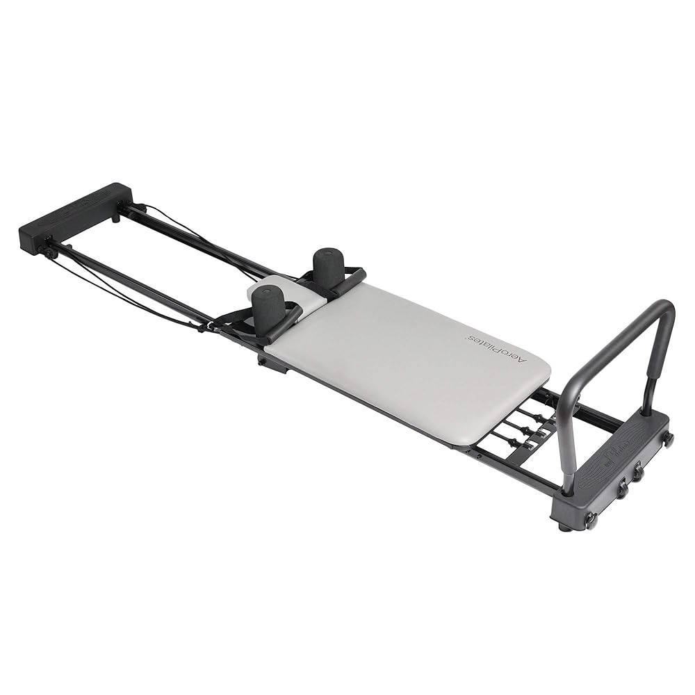 Stamina Products AeroPilates 287 Pilates Reformer – Home Gym Equipment with Adjustable Headrest, Padded Foot Bar, 3 Resistance Cords, and 2 Workout DVDs