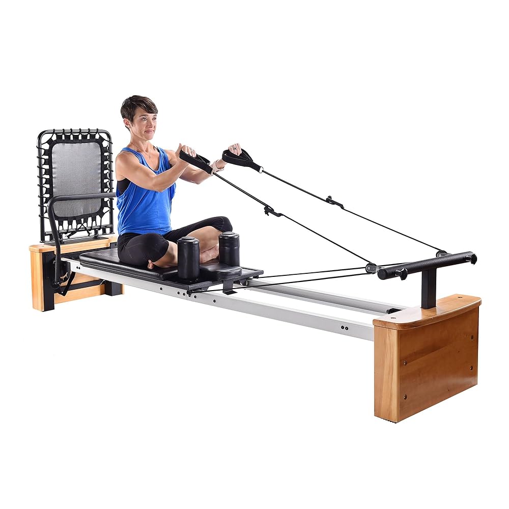 Stamina Products AeroPilates Board Pro XP557 Pilates Reformer with Oak Wood Base – Studio Grade for Home Use with Cardio Rebounder, Adjustable Foot Bar, 4 Resistance Springs, and Workout DVDs