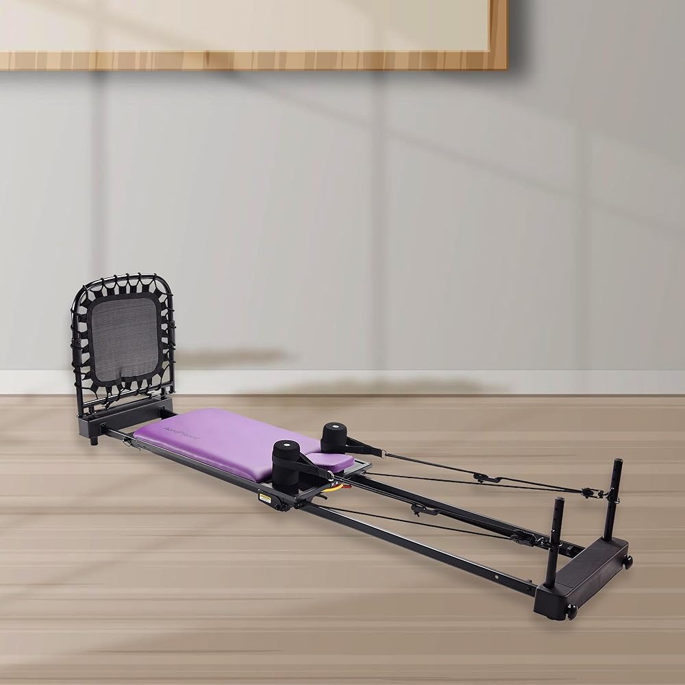 Stamina Products AeroPilates Reformer Plus 379, Pilates Home Gym Equipment with Cardio Rebounder, Padded Foot Bar, 4 Resistance Cords, and Workout DVDs